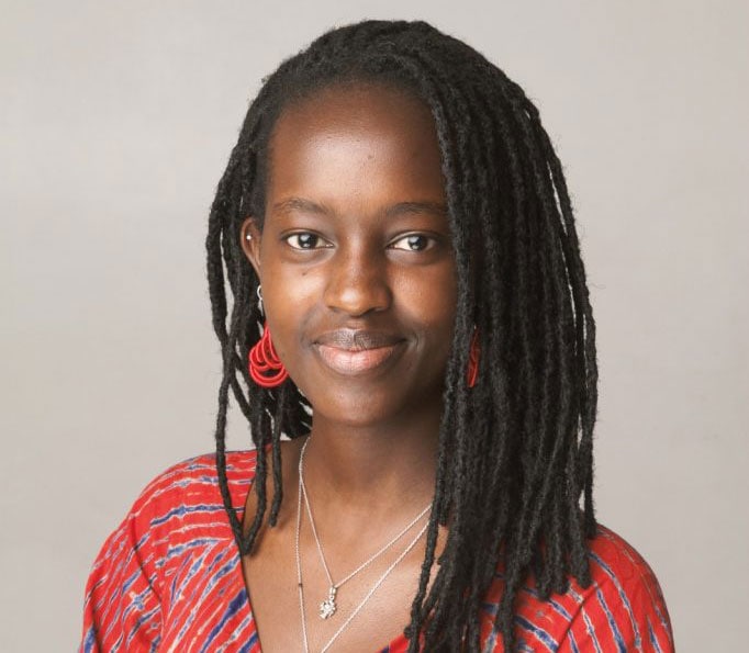 Portrait photo of Marie-Reine Mukazayire smiling.