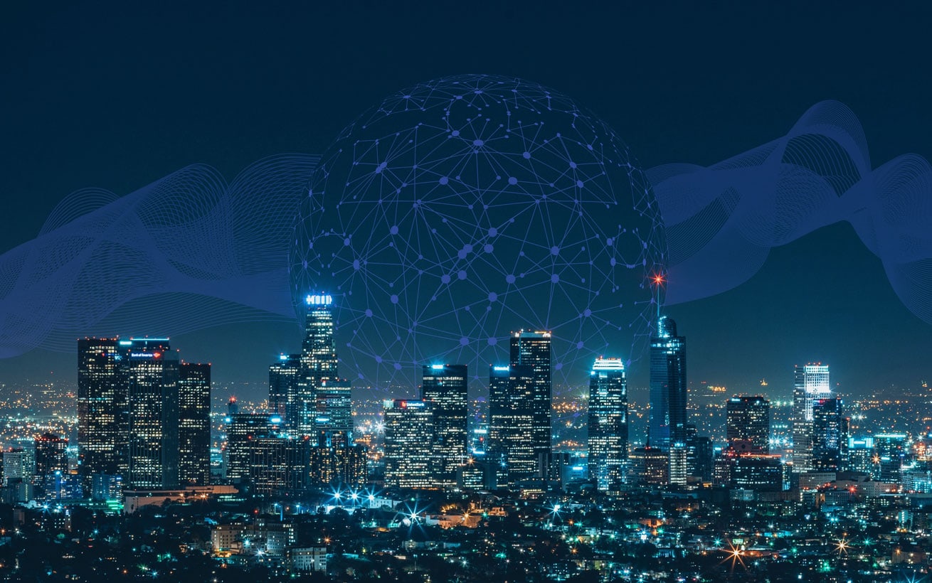 In an artist's illustration, a globe made of interconnecting nodes is superimposed on a city skyline at night.