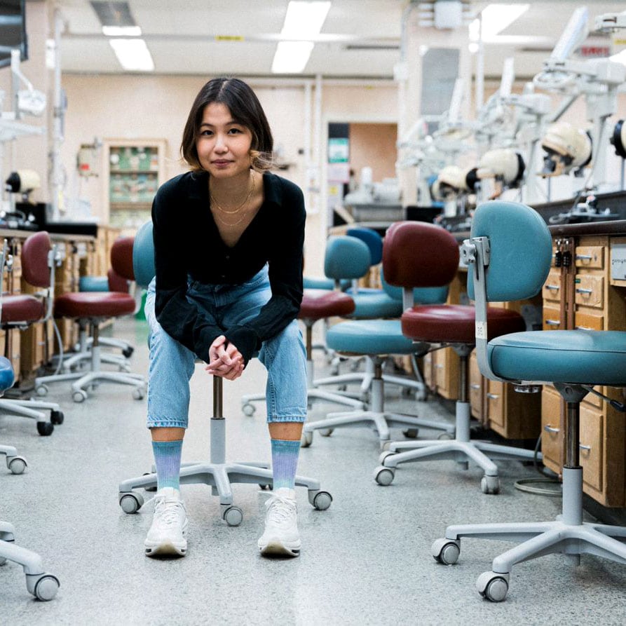 Sonia Huang sits in the old Lab 4 with its battered chairs and old wooden cabinets.