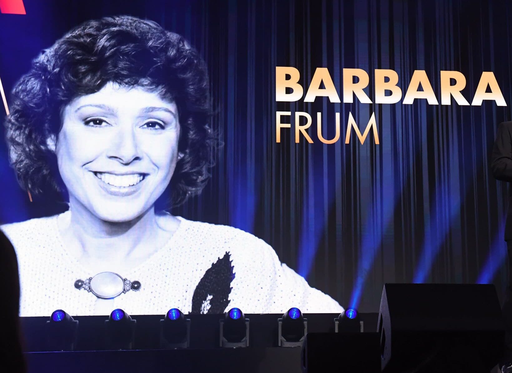 An image of Barbara Frum projected onto the stage