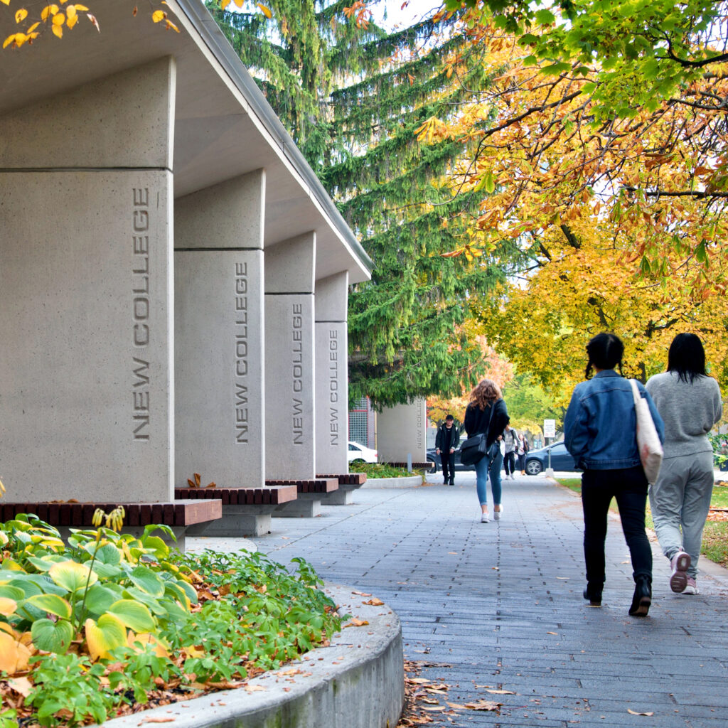 Students walking outside of New College, where the African Studies and Caribbean Studies programs originated