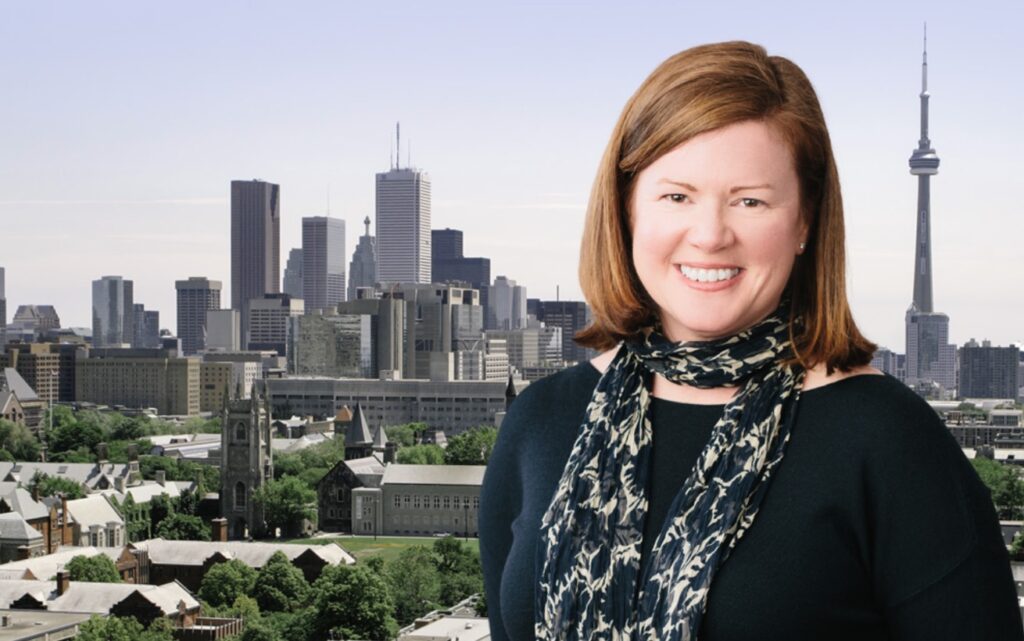 A portrait of Catherine Graham in front of the Toronto skyline