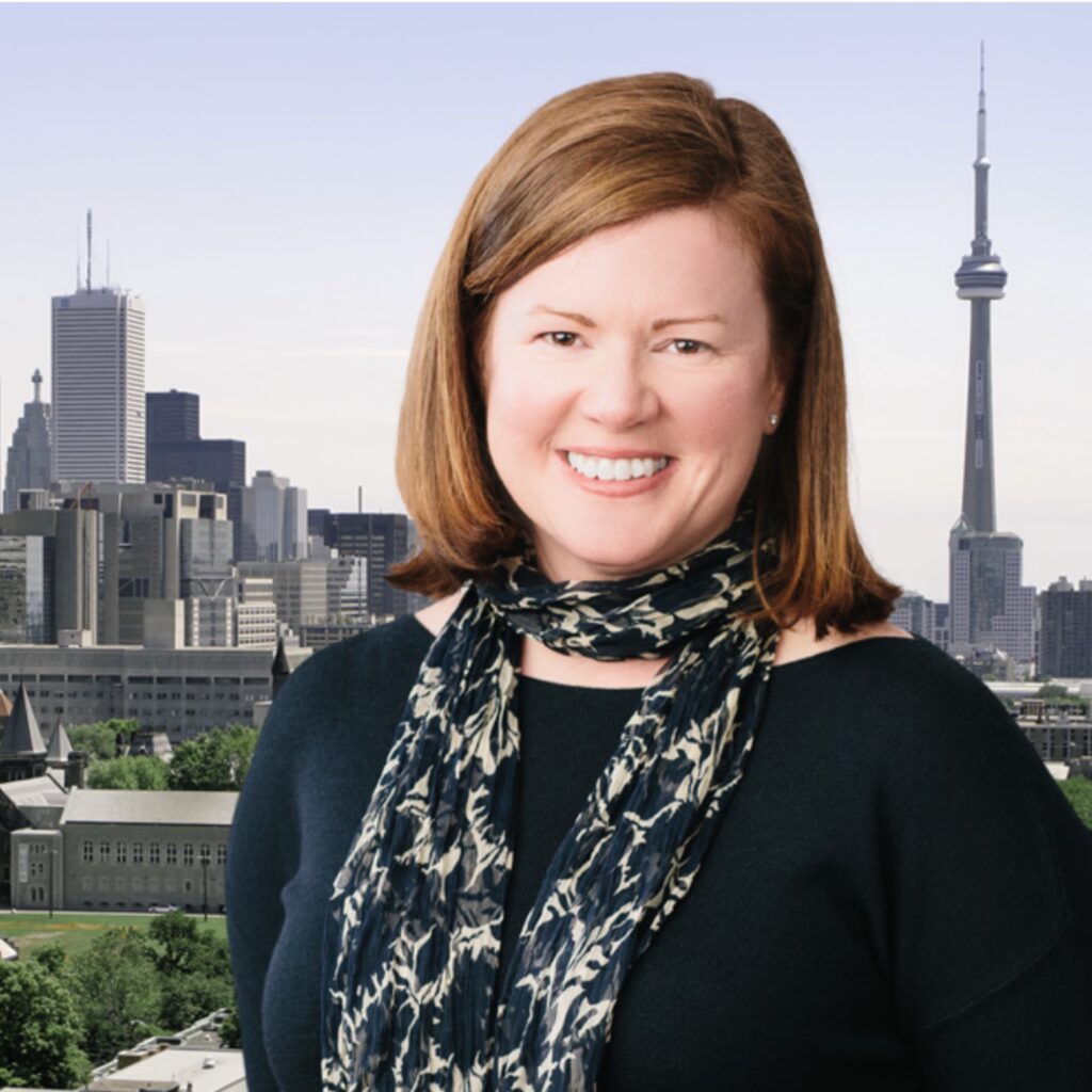 A portrait of Catherine Graham in front of the Toronto skyline