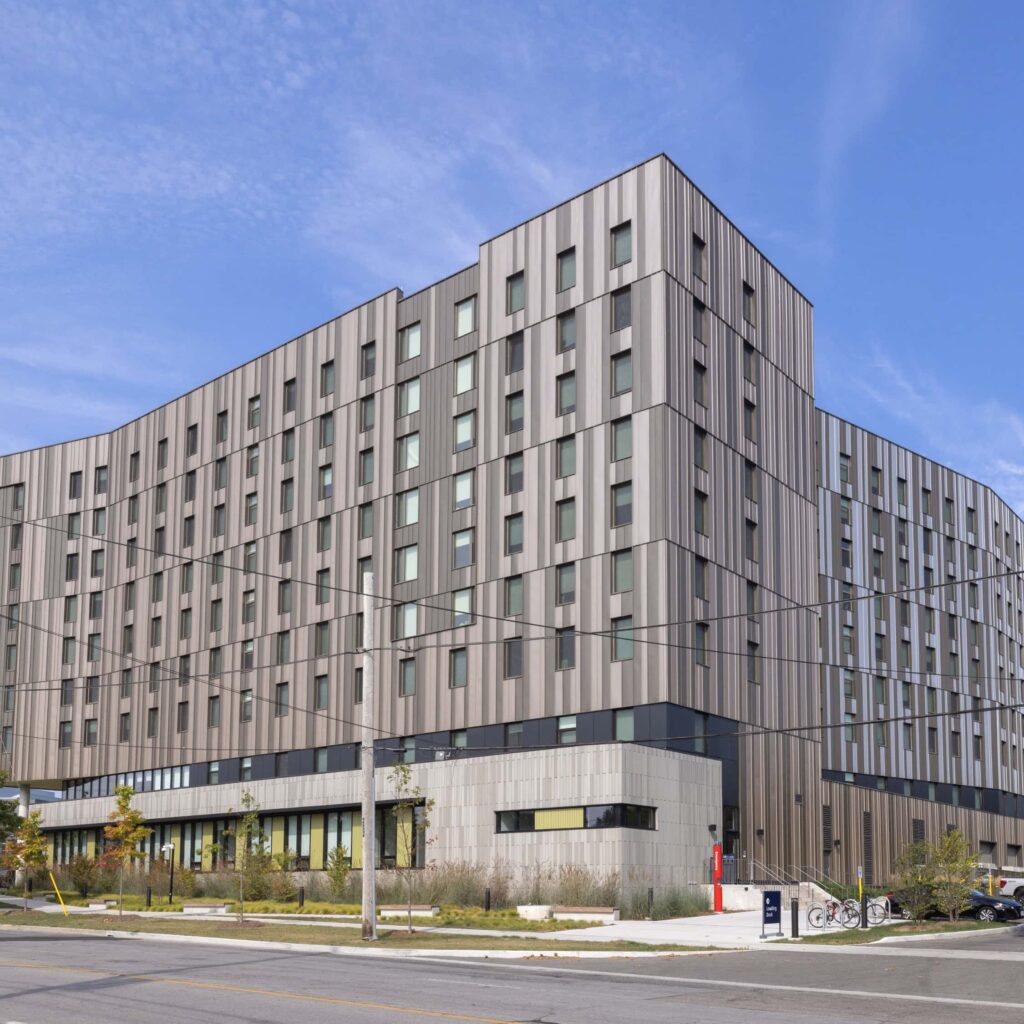 A shot of Harmony Commons building exterior on a sunny day