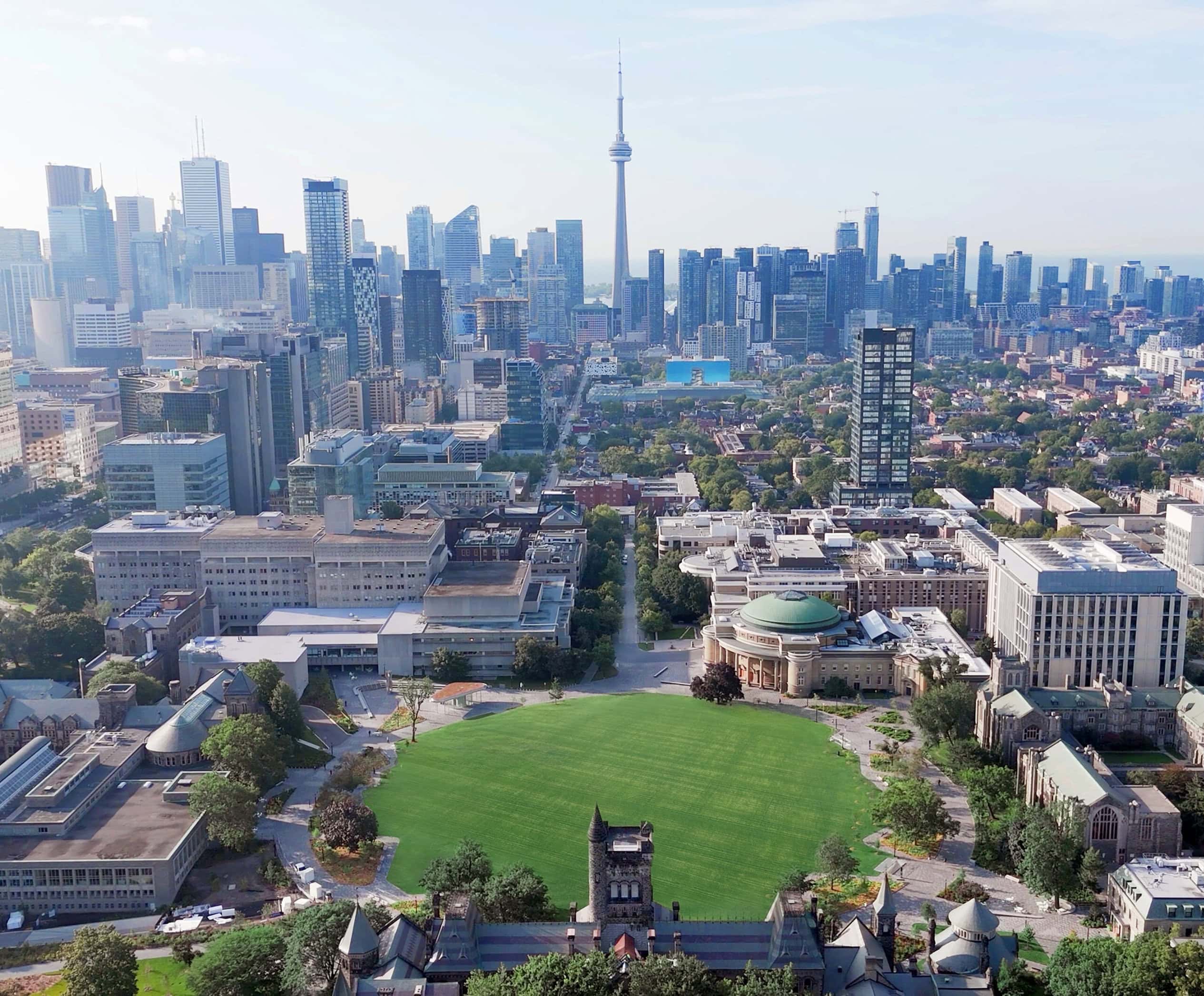 Aerial photo of U of T's St. George campus with Toronto city skyline in the background