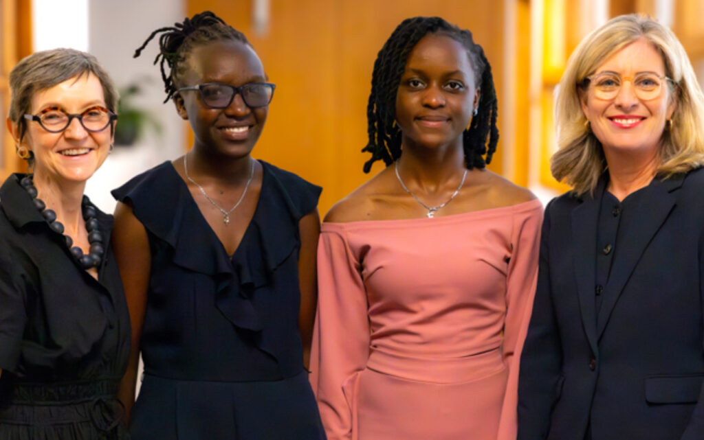 Four people posing for a photo