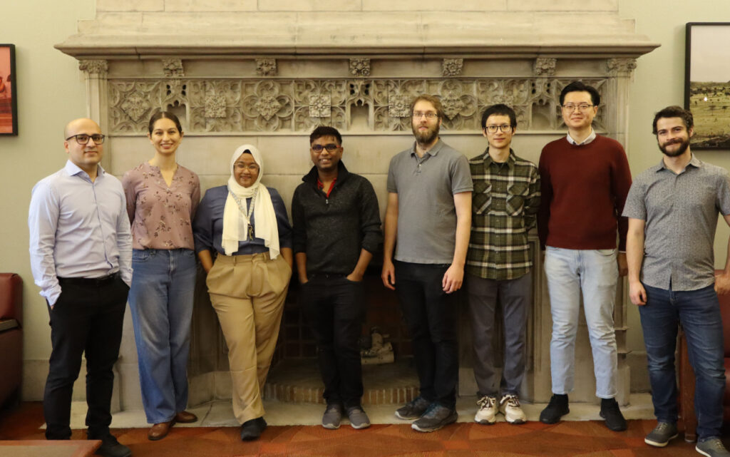 Eight of the Schmidt Fellows pose for a photo together