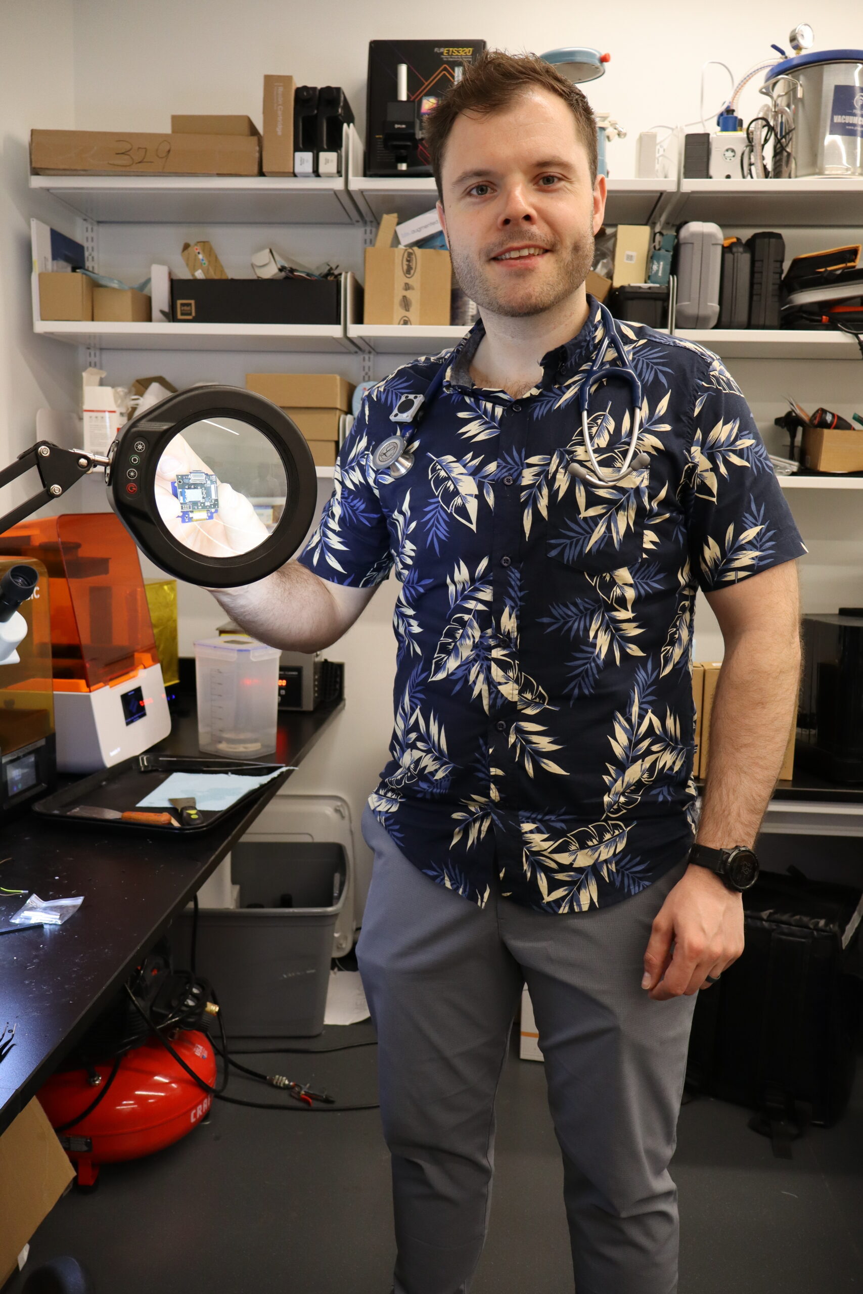 A person holding up medical device